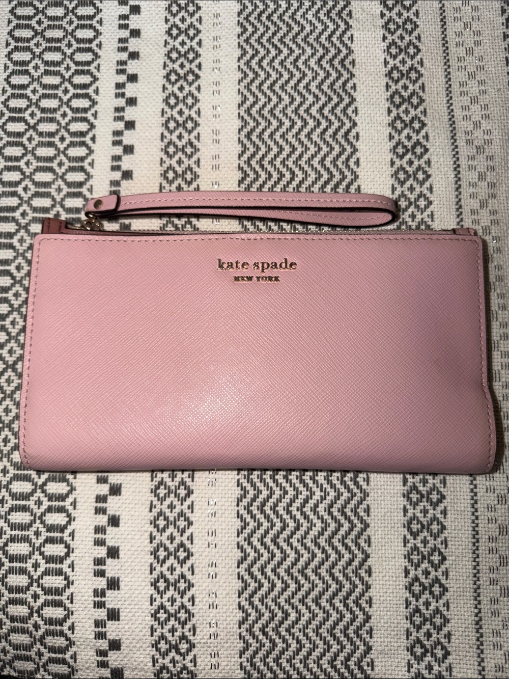 kate spade light pink saffiano wristlet clutch with gold logo